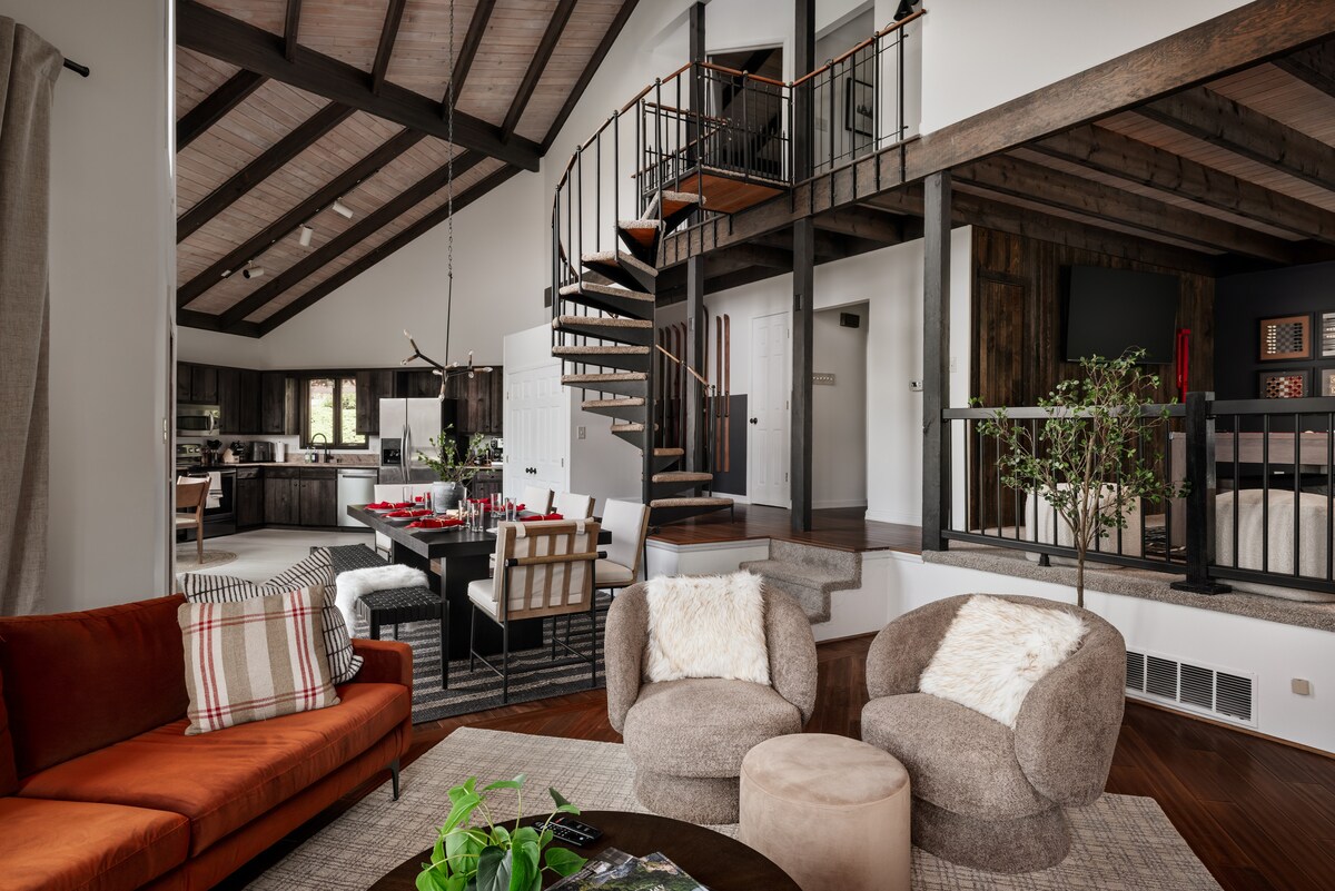 Open living room and vaulted wood ceiling